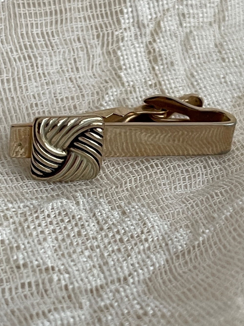 SWANK Gold Tone Tie Bar with Twisted Knot Accent